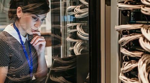 A woman looking at a network